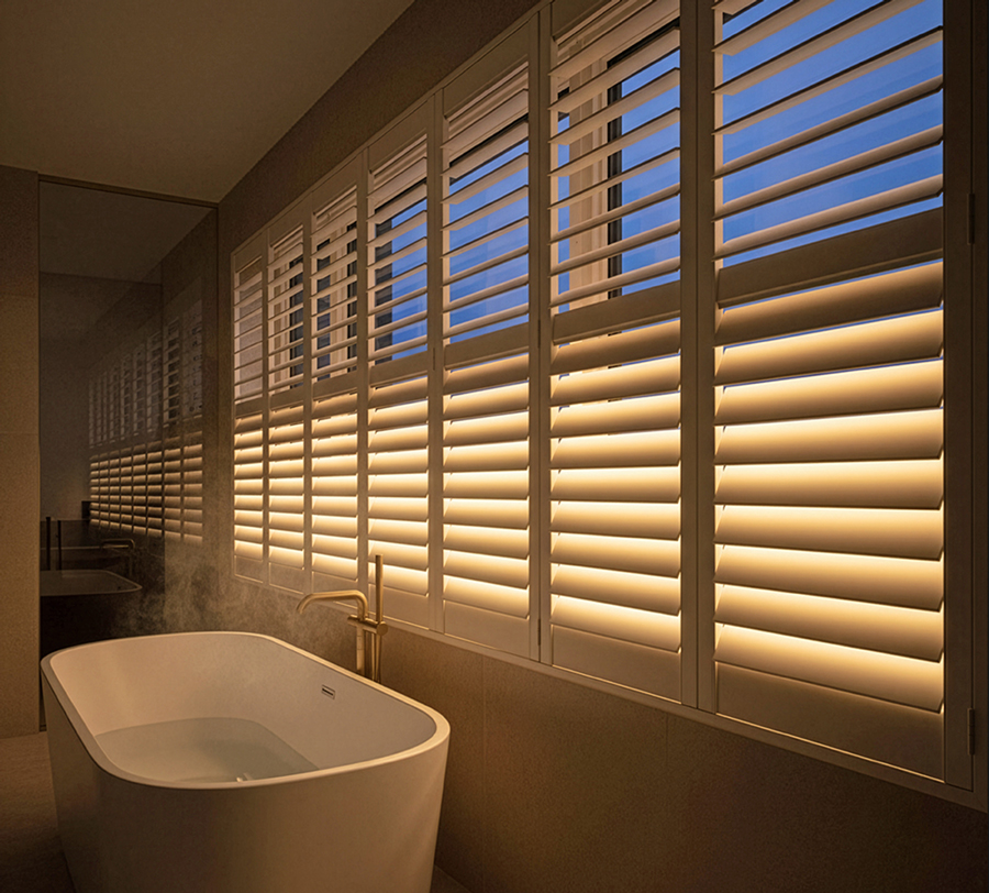 LiteLüvr softly illuminating a modern space from the window at dusk